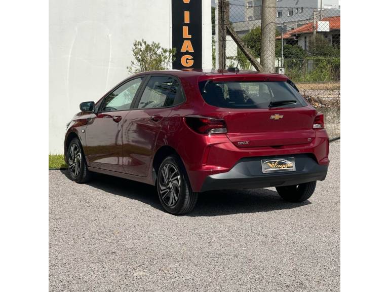 CHEVROLET - ONIX - 2023/2024 - Vinho - R$ 72.900,00